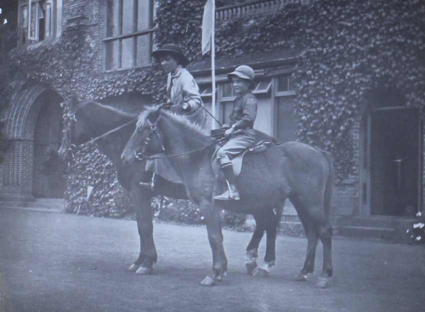 Unidentified children on horseback