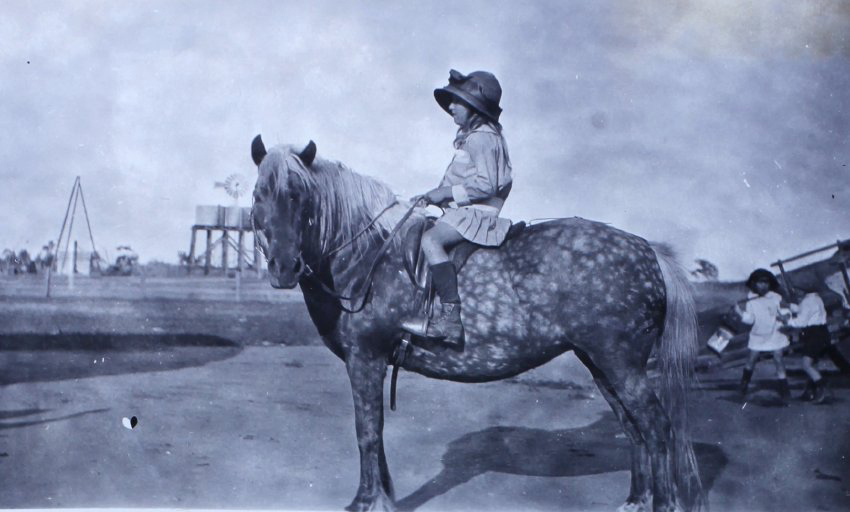 Unidentified young girl on a horse