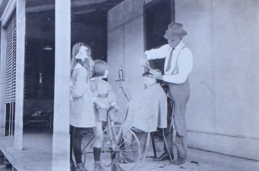 Young boy getting a haircut
