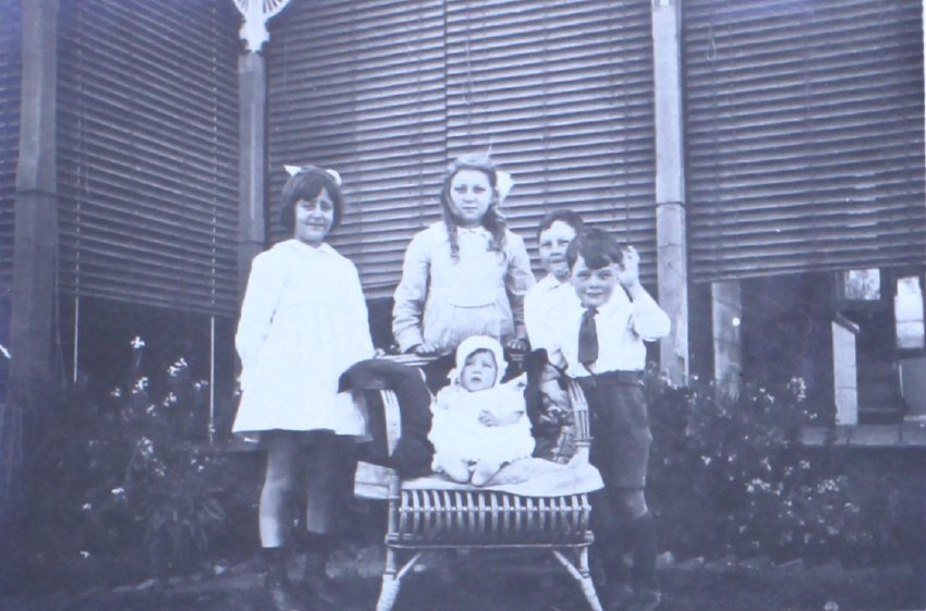 Young children with a baby