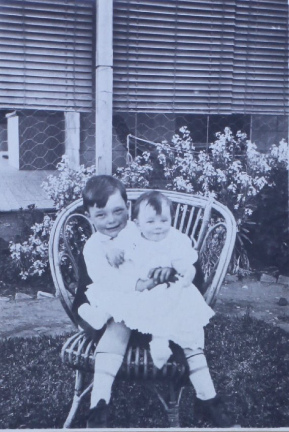 Young boy and a baby