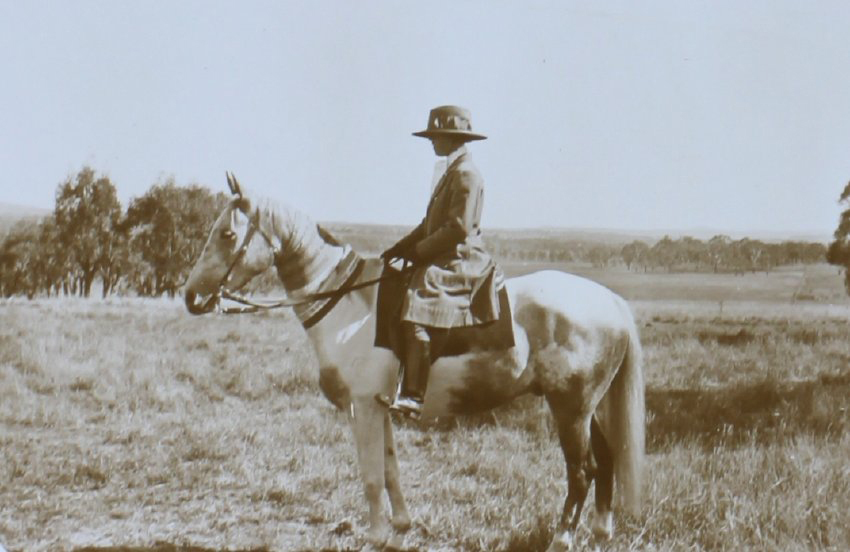 Unidentified woman on horseback