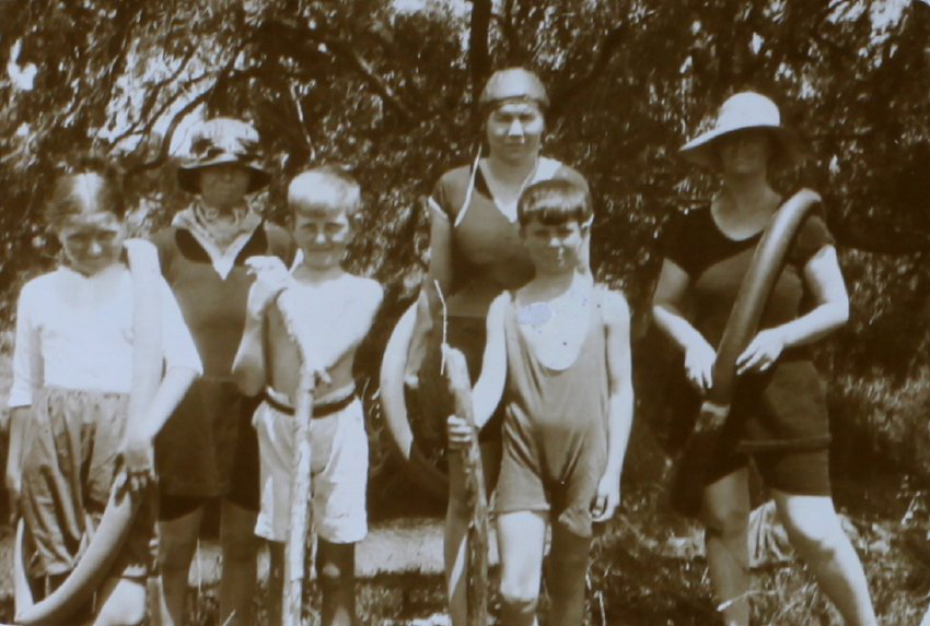 Women and children in swimming gear