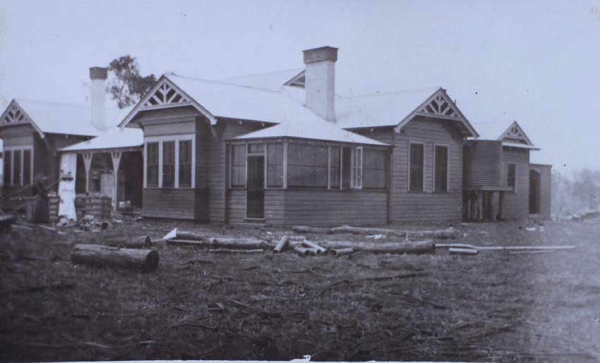 Woman outside a house