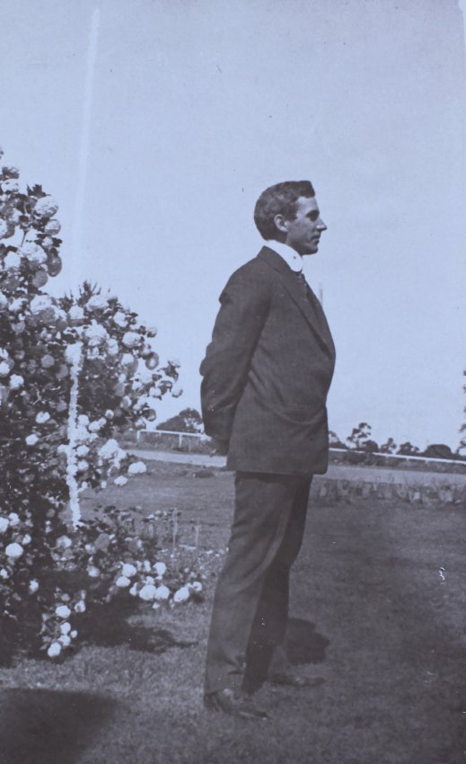 Unidentified man in profile in the garden
