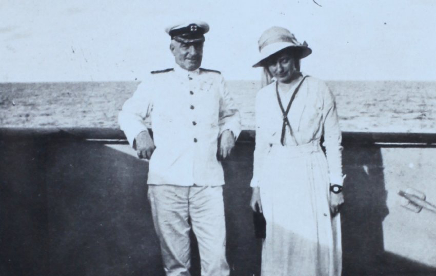 Naval officer and woman onboard a ship