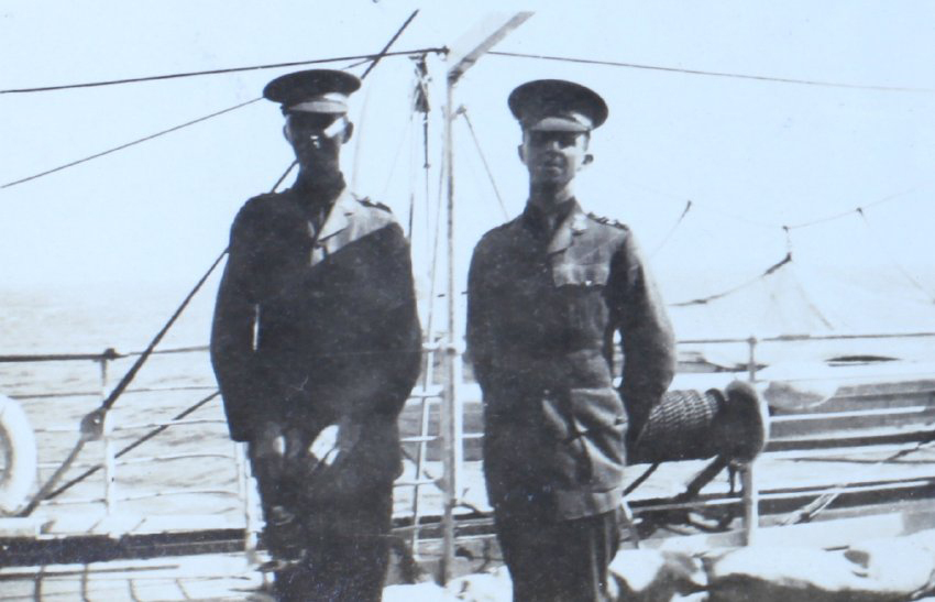 Two army officers onboard a ship