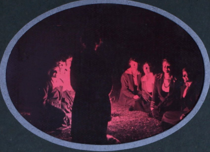 Women sitting around a fire