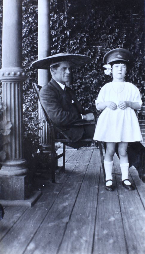 Man and a girl on the verandah