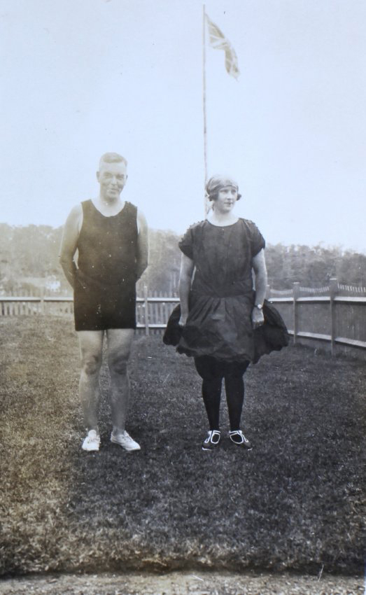 Unidentified man and woman in swimming bathers