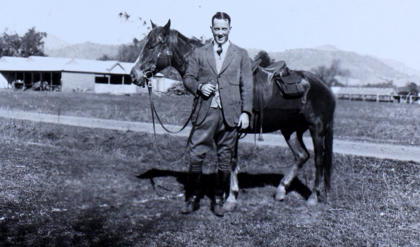 Unidentified man with a horse