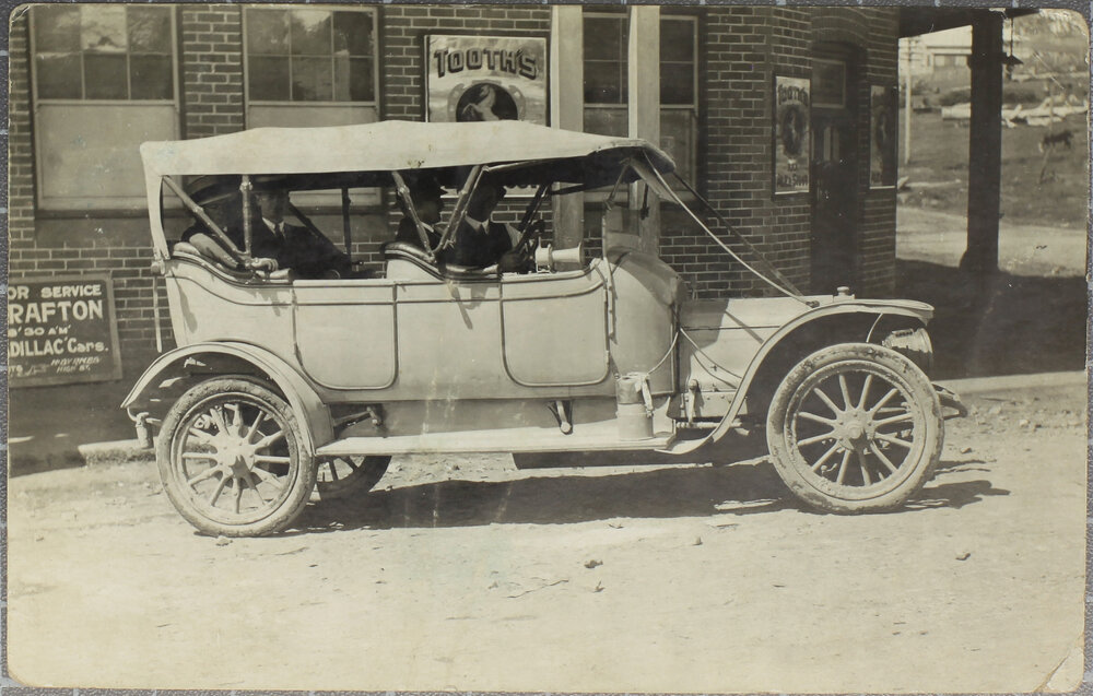 Motor Car outside Hotel