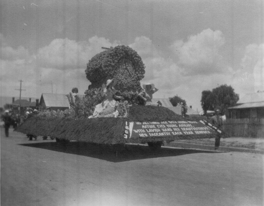 75th Procession 'Nature' float and three women, 1938