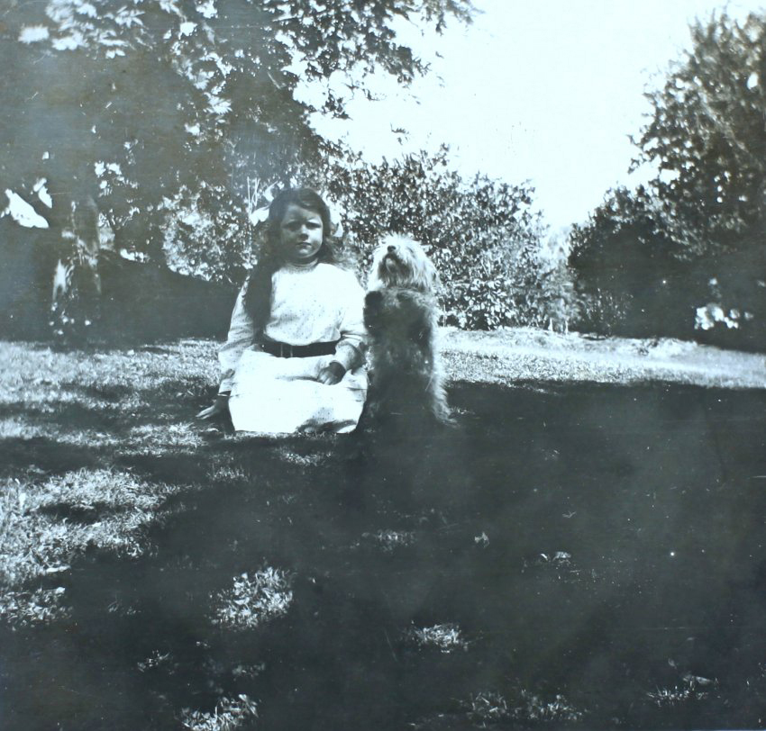 Young girl and a pet dog