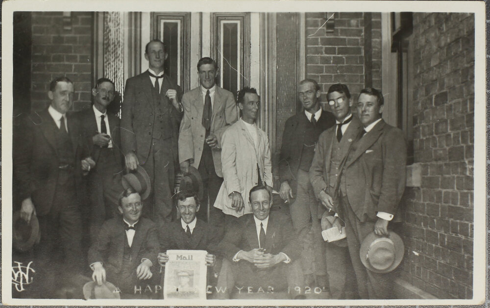 "Happy New Year 1920" a group of young men