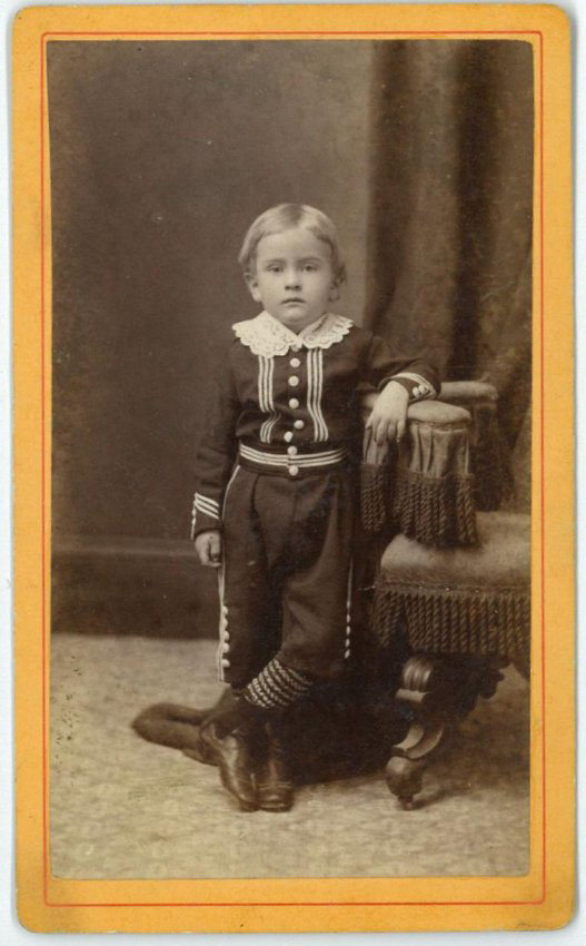 A carte-de-visite of an unidentified young boy, possibly a member of the Dutton family.