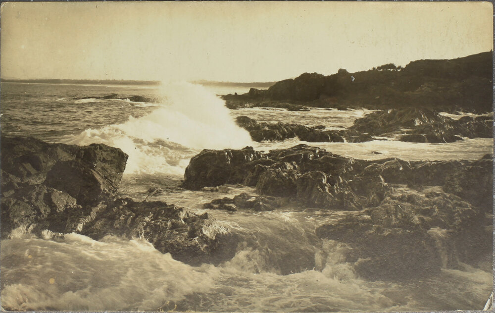 Waves crashing on rocks, coastal scene