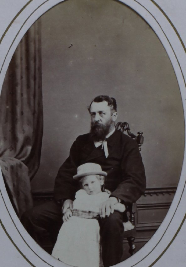 A carte-de-visite of an unidentified man and a young girl