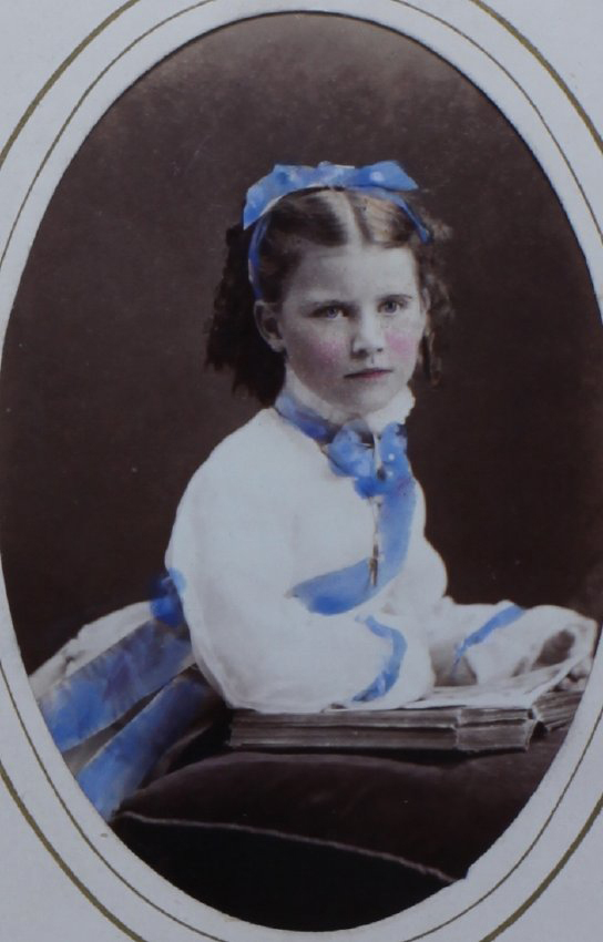 A tinted carte-de-visite of an unidentified young girl