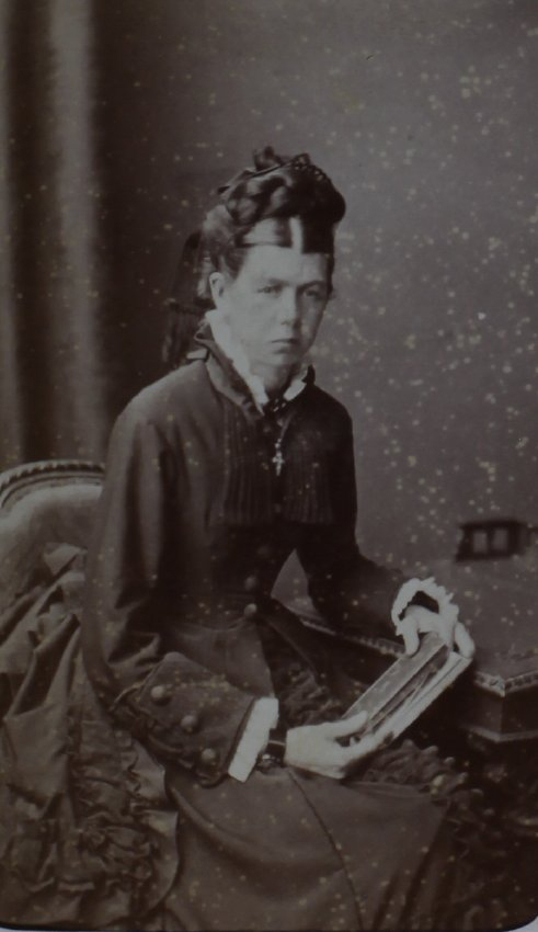 A carte-de-visite of an unidentified woman. Album page is annotated (in a modern hand) Betsy Campbell c 1872