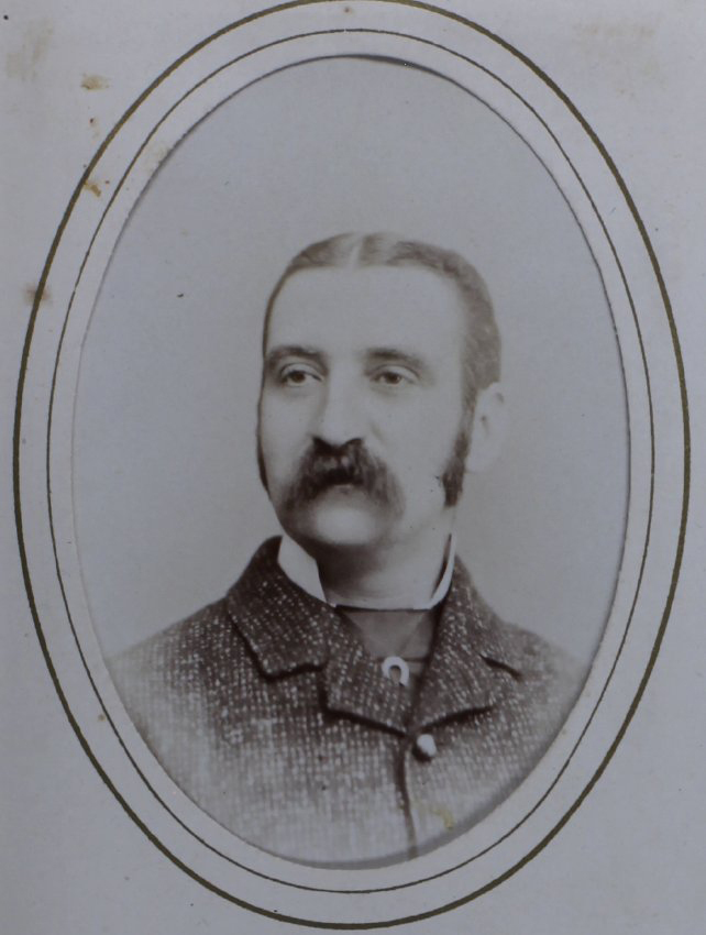 A carte-de-visite (on black board) of an unidentified man