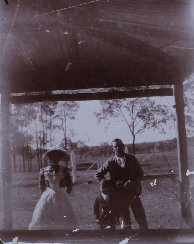 A photograph of an unidentified man, woman, and boy