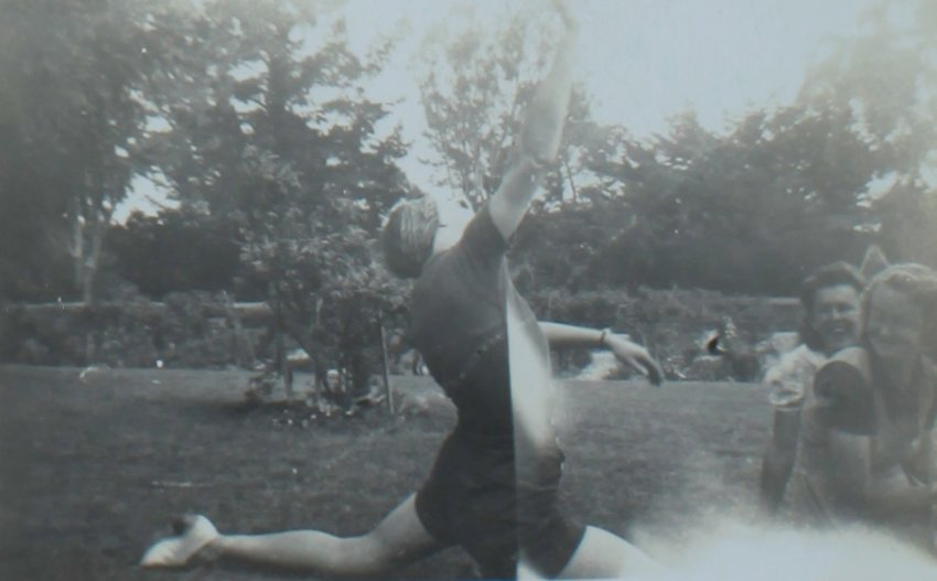 J. Pyce dancing in garden Booloominbah, N.E.U.C., 1942