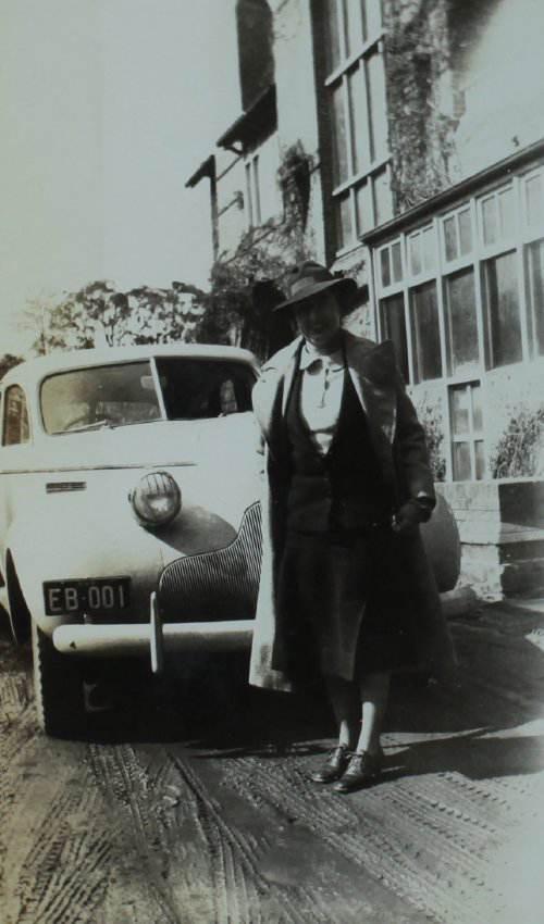 Mrs E.H. Booth in front of University near general entrance Booloominbah