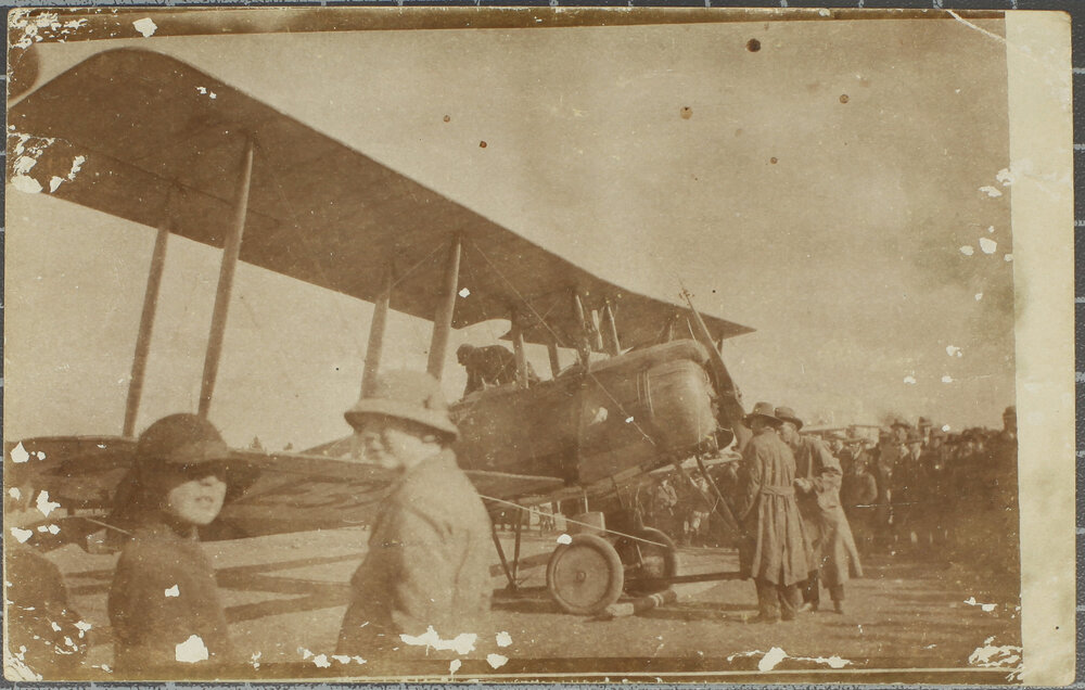 [Peace] plane, crowd gathered, [1919]