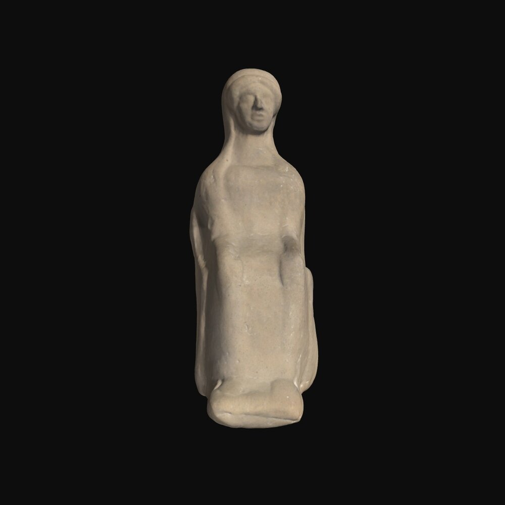 MA1962.1.1 Terracotta figurine of woman sitting