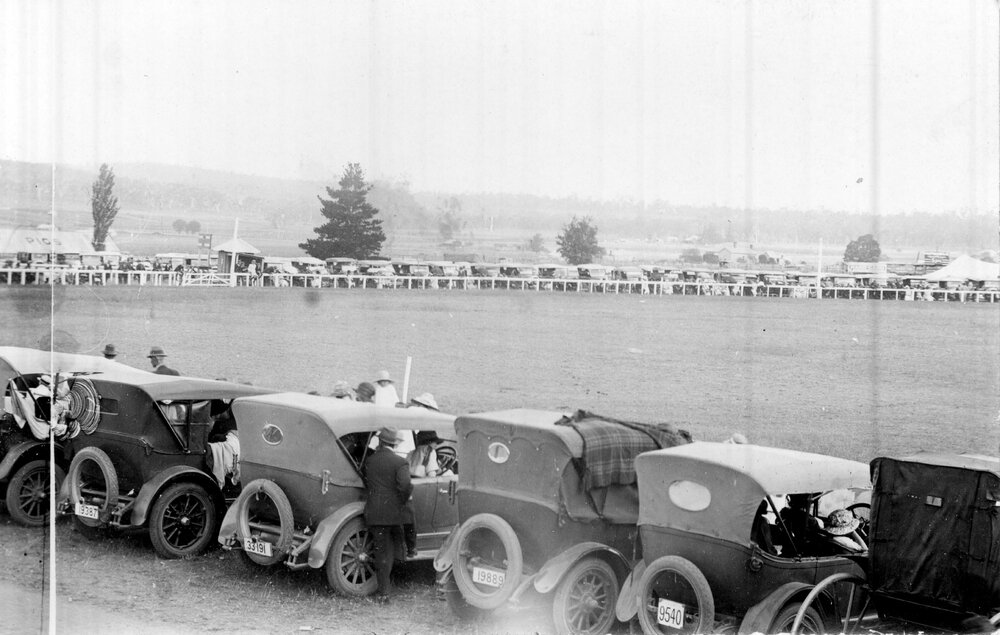 Armidale Show, looking southeast, with cars lining the fence, c. 1935