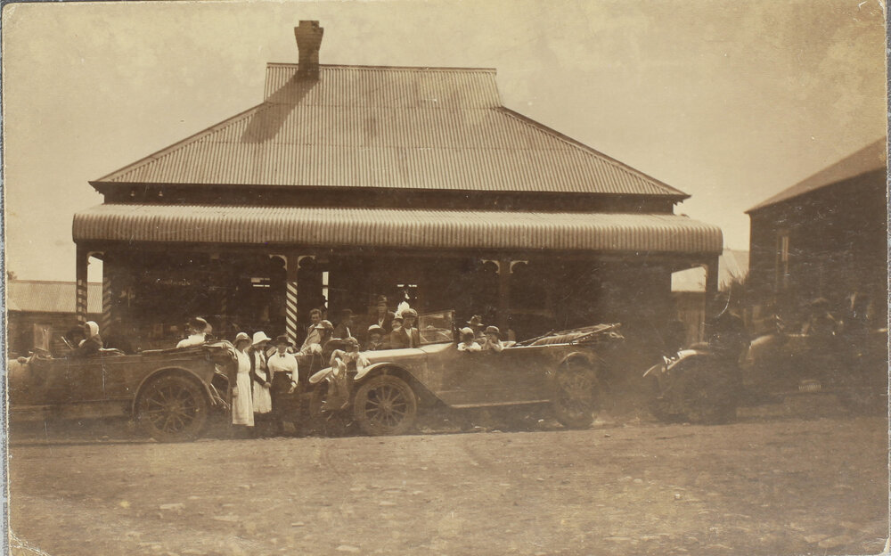 Car and group outside shop, [Dorrigo?]
