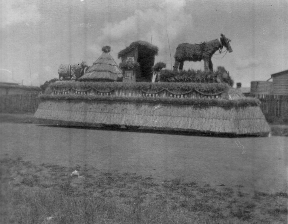 75th Procession float with straw horse, house and hay stack, 1938