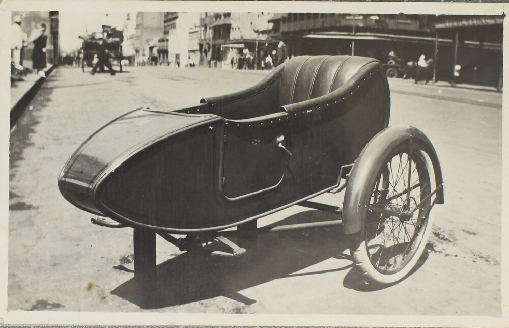 Motorbike sidecar parked in street [Sydney?]