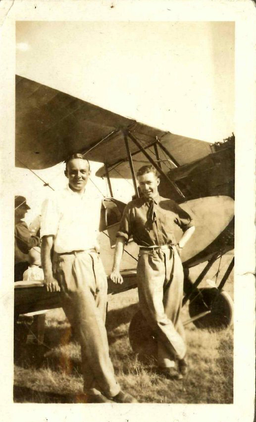 Kingsford Smith Album, two aviators and plane