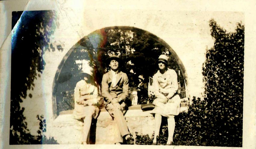 Three People in a Garden