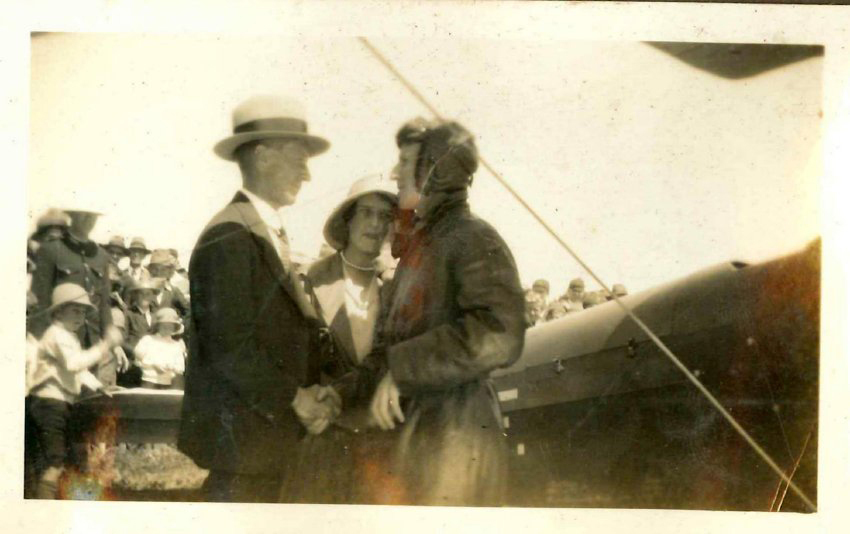 Kingsford Smith Album, Charles Kingsford Smith with Plane and Unidentified Couple