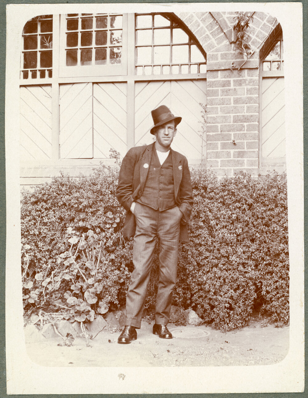Man in three-piece suit and top hat