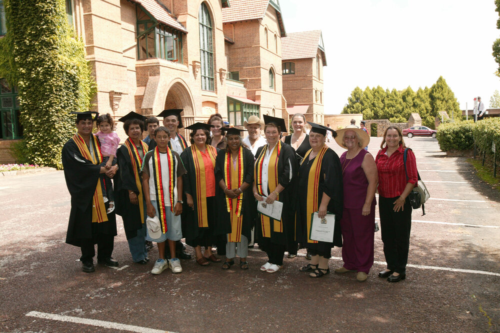 Group of graduates and families outside Booloombinbah, TRACKS Graduation Ceremony,  2005