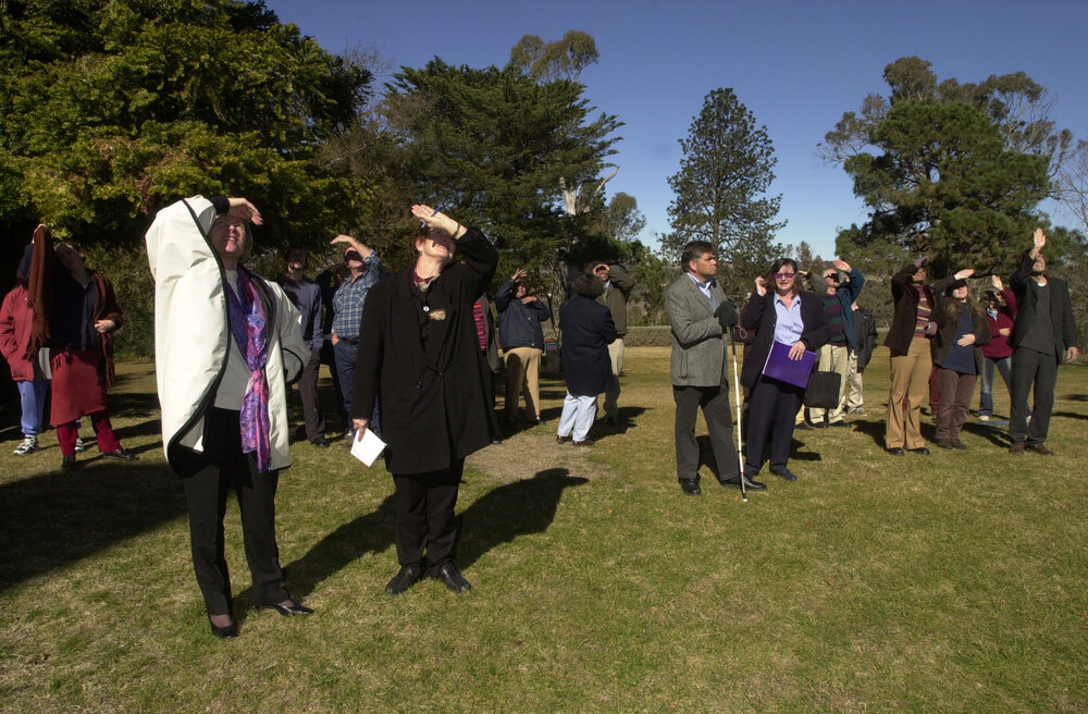 Prof. Ingrid Moses, Lyn Tucker, Steve Widders - flag raising at Booloombinbah, NAIDOC 2002
