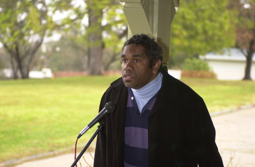 Michael Brogan speaking at NAIDOC Week opening and flag raising at Booloominbah, hosted by the Oorala Aboriginal Centre, 2001