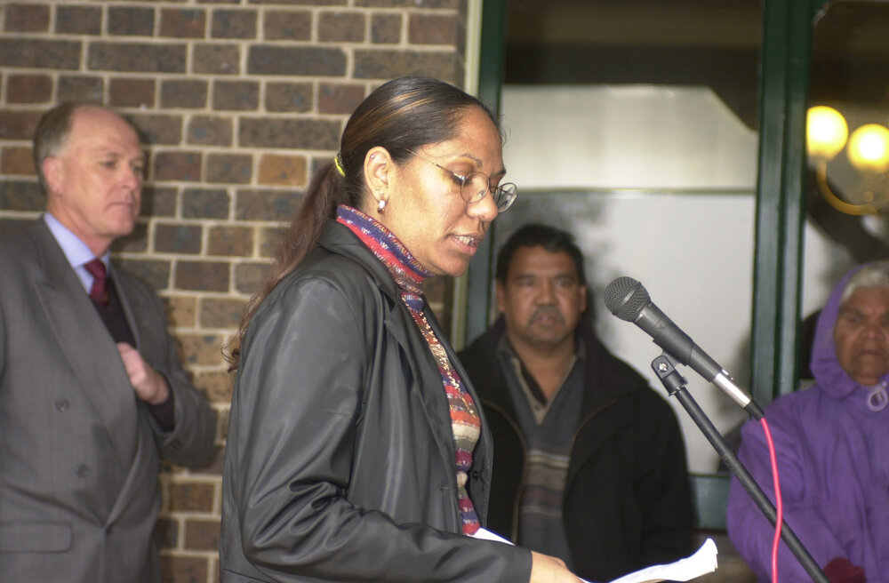 Lorina Barker, Oorala Student Support Officer, speaking at NAIDOC Week opening and flag raising at Booloominbah, hosted by the Oorala Aboriginal Centre, 2001