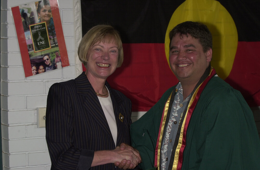 Professor Ingrid Moses with Danny Naylo  TRACKS Graduate, 2001