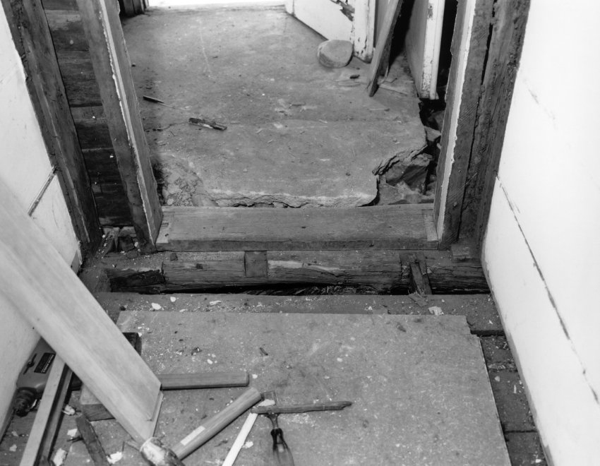 Interior view of a house in Markham Street before renovations