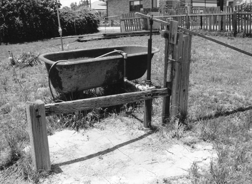 Hand pump to well at house in Markham Street before renovations