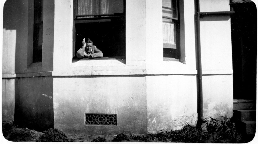 Hec Shaw at window of "Whare Koa" student residence, Armidale Teachers' College, 1930