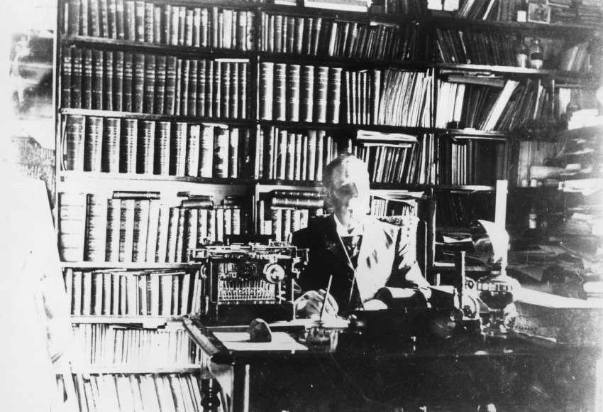 Henry Tonkin, headmaster of Hillgrove Public School 1888-1909, seated in his study, c. 1900