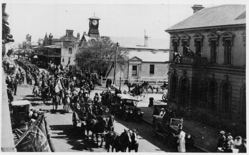 Procession in Beardy Street, showing Court House, after World War I (1914-1918)