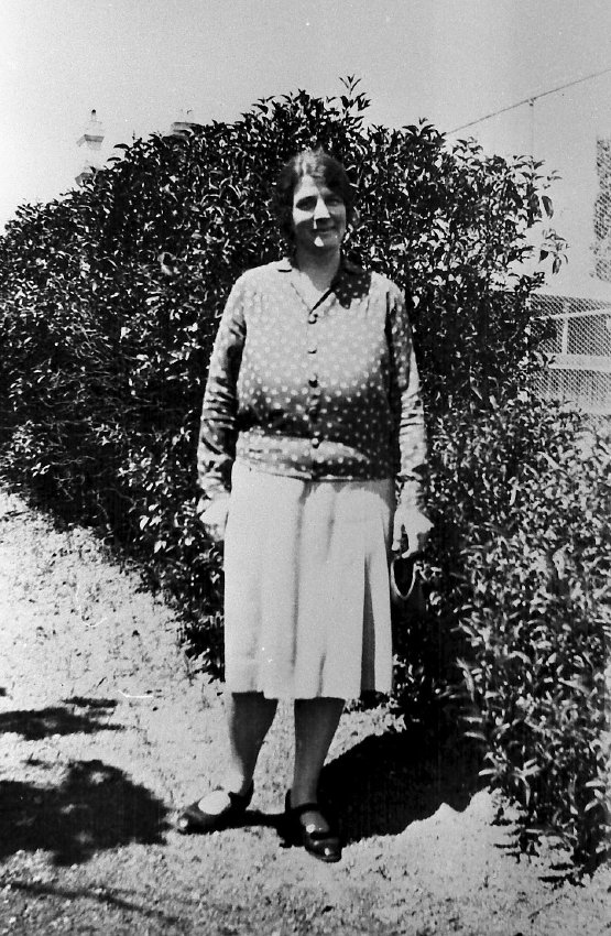 Armidale Teachers' College, Smith House, Miss E.M. Roulston in grounds of "Girrahween", 1929