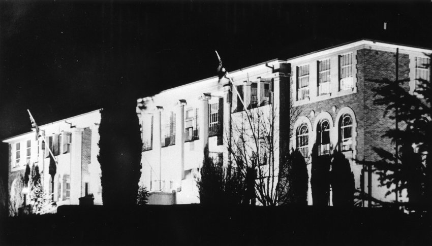 Armidale Teachers' College, building illuminated for celebration of UNE's autonomy, 1955